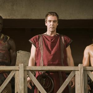 Still of John Hannah Peter Mensah and Dustin Clare in Spartacus Gods of the Arena Paterfamilias 2011