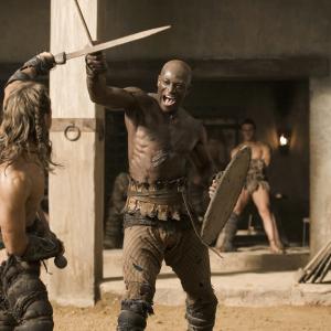 Still of Peter Mensah and Dustin Clare in Spartacus Gods of the Arena 2011