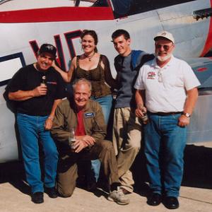 L to R: stunt pilot Dan Martin, producer Robin Shaw, director Gary Ambrosia, pilot Hugh Bikle, pilot Elsworth Getchell (down front).