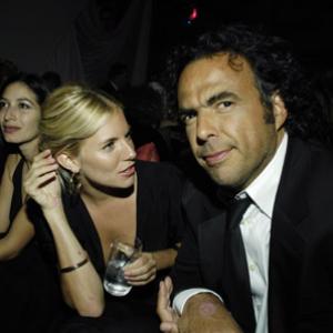 Alejandro González Iñárritu and Sienna Miller