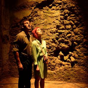 Still of Jason Isaacs and Alison Sudol in Dig 2015