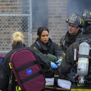 Still of Taylor Kinney and Monica Raymund in Chicago Fire (2012)
