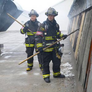 Still of Mo Gallini and Taylor Kinney in Chicago Fire 2012