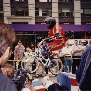 David Copeland performing a ramp to ramp bicycle jump over Evel Knievel in the middle of Times Square NYC for Viva Variety on Comedy Central