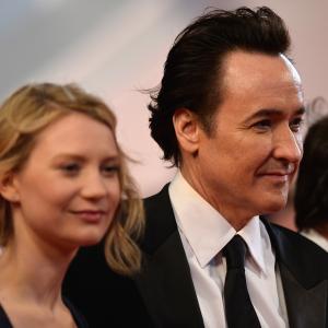 John Cusack and Mia Wasikowska at event of Maps to the Stars 2014