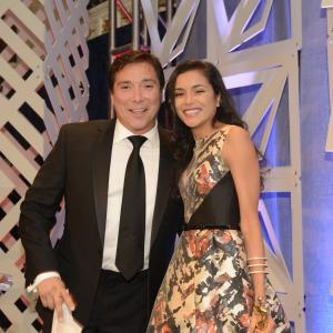 Benito Martinez Awards Actress Emily Rios with the 2014 Horizon Award at the 18th annual Noche De Gala for the National Hispanic Foundation for the Arts at the Renaissance Mayflower Hotel on October 1 2014 in Washington DC