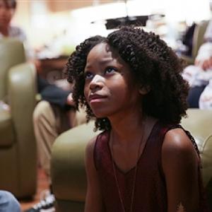 LOS ANGELES CA  MARCH 25 Actress Riele Downs watches cartoons with children as she brings the Kids Choice Awards experience to Childrens Hospital Los Angeles on March 25 2015 in Los Angeles California