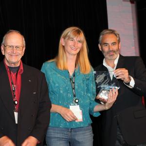 Olivier Parthonnaud and Laura sivis accepting the First Prize for S21-3D at Dimensionale 3D Film Festival Awards Gala