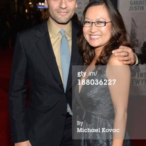 Helen Hong with costar Oscar Isaac at the Los Angeles premiere of Inside Llewyn Davis