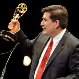 Ricardo Andrade receiving 12th Emmy At 30th News and Documentary Emmy Awards for the Art Direction and Graphic Design of PBS's Illicit: The dark trade.