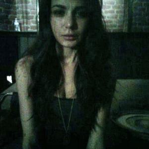 Natalina Maggio playing Nikki the waitress in the 2014 thriller Blood Ransom Crying and facing the killer