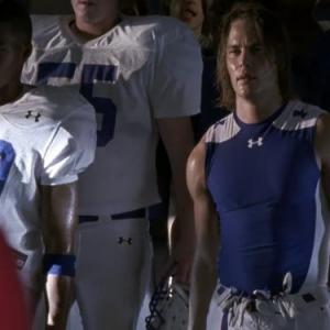 Still of Taylor Kitsch and Gaius Charles in Friday Night Lights 2006