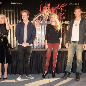 Jena Malone Sam Claflin Stephanie Leigh Schlund  Alan Ritchson attend The Hunger Games Catching Fire Victory Tour at Bank United Center on November 4 2013 in Miami Florida
