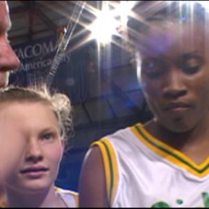 Still of Darnellia Russell and Bill Resler in The Heart of the Game 2005