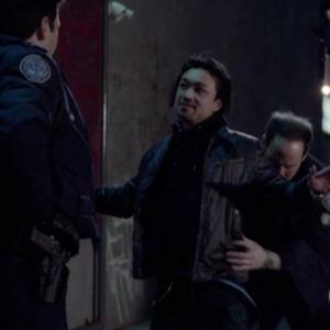 Norman Yeung as Tommy Chan, with Ben Bass and Matt Gordon in ROOKIE BLUE