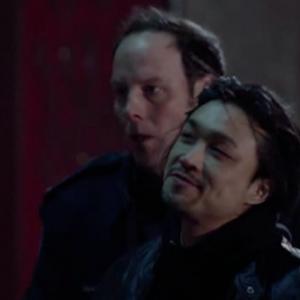 Norman Yeung as Tommy Chan, with Matt Gordon in ROOKIE BLUE