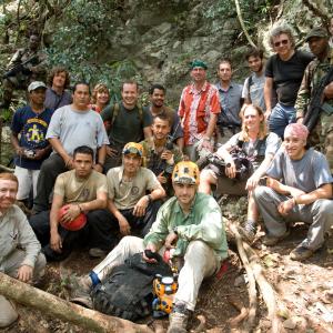 TV director Ian Stevenson black tshirt top right with crew and military police escort on location in Bolvian jungle for The Discovery Channels Bone Detectives More at wwwianstevensontv