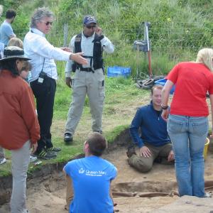 TV director Ian Stevenson (in white shirt) directs The Discovery Channel's 'Bone Detectives' in northern England. Host Scotty Moore kneels beside mummy. More at www.ianstevenson.tv