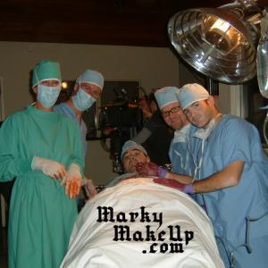 Marky working a blood rig on the set of Cutters Club and playing the part of a surgeon!