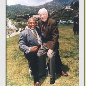 George Foreman and Barney Oldfield