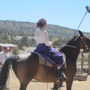 Sarah Archer rides on location in Big Bear in Tales of the Frontier The Bride