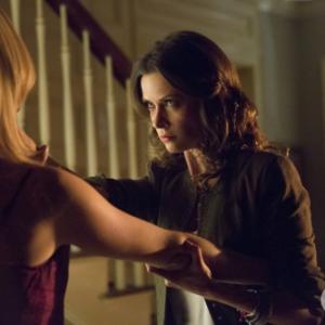 The Vampire Diaries  No Exit Pictured LR Candice Accola as Caroline back to camera and Olga Fonda as Nadia  Photo Bob MahoneyThe CW   2014 The CW Network LLC All rights reserved