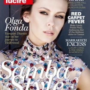 Olga Fonda on the cover of LUCIRE Magazine.