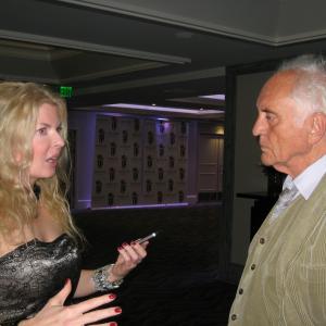 Adrienne Papp of Atlantic Publicity and Terence Stamp at the International Press Academy Awards 2012 Los Angeles Interview