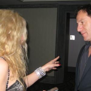 Adrienne Papp of Atlantic Publicity interviewing Jason Isaacs at the 2012 International Press Academy Satellite Awards December 16 2012