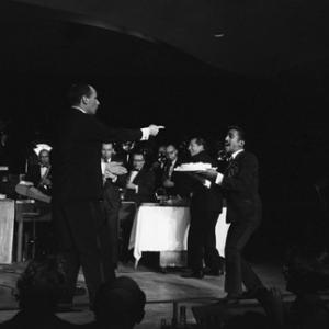 Joey Bishop Buddy Lester and Sammy Davis Jr performing in the Copa Room at the Sands Hotel in Las Vegas