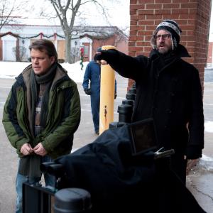 Still of Matt Damon and Steven Soderbergh in Uzkratas 2011