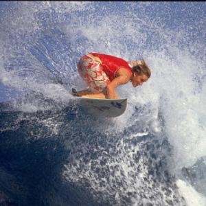World class bigwave surfer Keala Kennelly off the lip in Tahiti