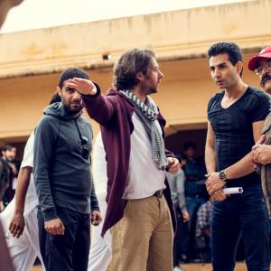 Producer Chris Robb, Director Hassan Nazer, 1st Assistant Director Kulddep Khangarot and acting coach Vahid Rhabani on location in India during filming for 'Utopia' 2014.