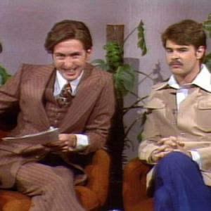 Still of Dan Aykroyd and Eric Idle in Saturday Night Live 1975