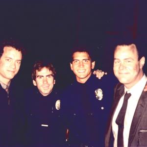 Tom Hanks Sydney Urshan Gary Velasco and Dan Aykroyd on set of Dragnet 1987