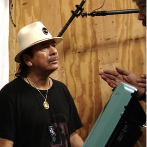 Carlos Santana and Craig Abaya on the set of Bridge School News
