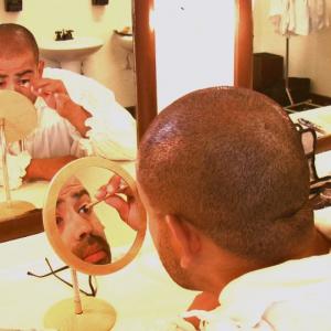 Eliezer Ortiz is getting ready and putting the makeup on for the role of Commandante in The Mission Play at the San Gabriel Mission Playhouse