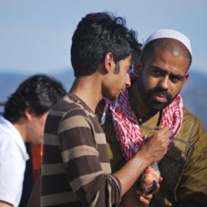 Eliezer Ortiz as Bashir with the Director Faizan Kareem on the set of the film The Knowing of Ali
