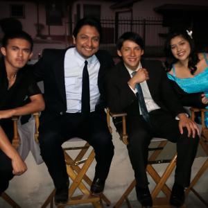 Omar Leyva with Carlos Pratts Chelsey Rendon and Sergio Avelar on the set of Disneys McFarland USA