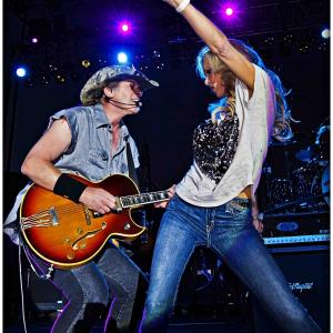 Dancing on stage with husband Ted Nugent