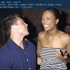 Chris Neville and Aisha Tyler at Roses Cocktail Infusions Launch Party