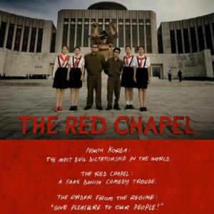 This is the movie poster for The Red Chapel which was Directed by Mads Brgger and filmed and edited by Ren Johannsen What you see is Simon and Jacob with schoolgirls Pyongyang Northkorea 2006