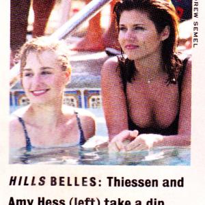 Amy Hess and Tiffani AMber Thiessen cooling off on the set of 90210 as featured in Entertainment Weekly