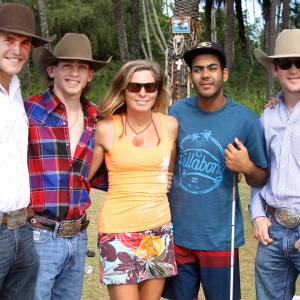 Actress Producer Faith Fay Pro Surfer Derek Rabelo and Pro bull riders Thad Newell Zane Cook and Jake Nelson on the set of the documentary film Surfer Cowboy