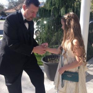 Malia getting her first flower Father Daughter dance