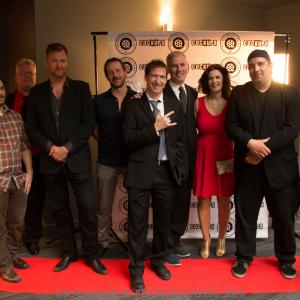 Director and actor Gerard Jamroz with cast and crew of The Cockups Movie