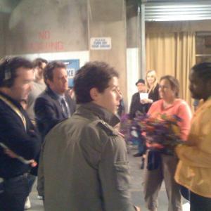 Carl McDowell, Matthew Perry, and Nick Jonas taking direction on the set on Mr. Sunshine