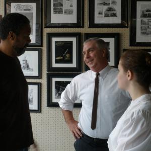 CJ blocking scene with director Kevin Willmott on the set of Jayhawkers