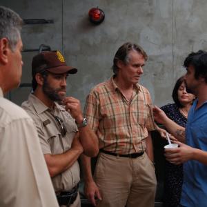Chris Elston giving James Casey direction on the set of SHELTER - also pictured are Alan Cassman and Chad Nell