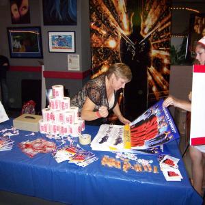 Autographing movie posters for fans at the 